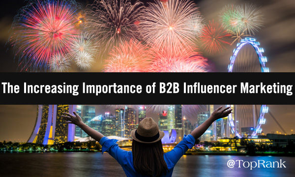 The increasing importance of B2B influencer marketing woman celebrating in front of fireworks image