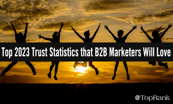 Top 2023 trust statistics that B2B marketers will love people jumping in front of sunset image