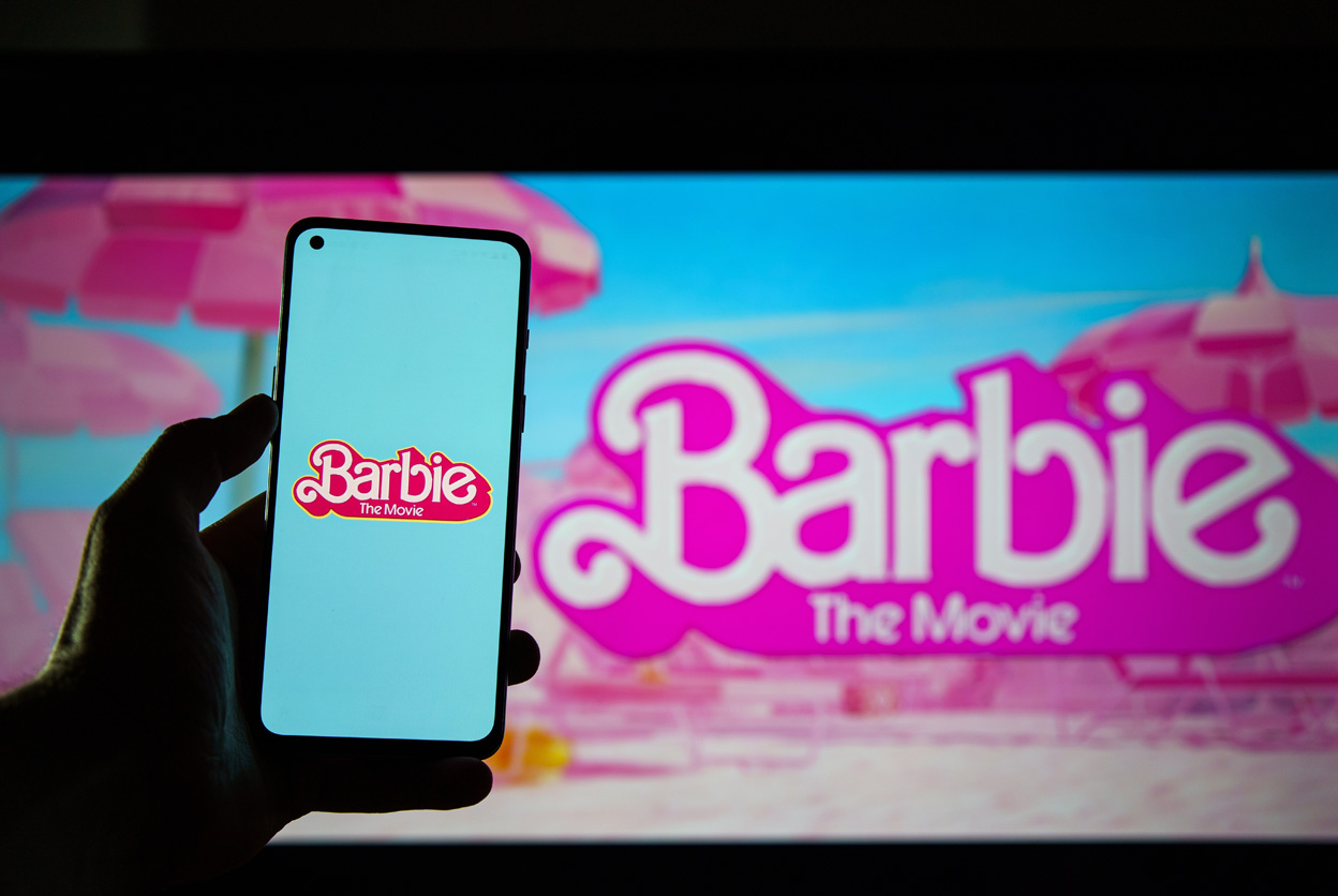 What B2B Marketers and Influencers Can Learn from The Barbie Movie hand holding phone with Barbie image